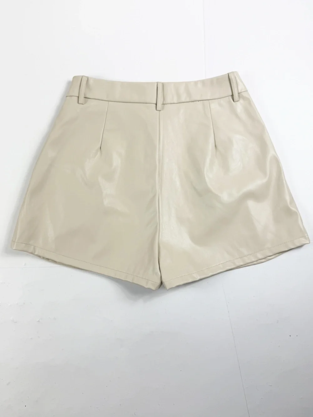 Shinestar Pleated Vegan Leather High-Waist‎ Shorts in Beige Medium